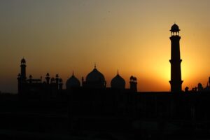 Badshahi Mosque in Lahore city under blue sky, symbolizing Lahore’s culture and heritage.